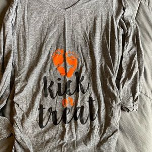 Kick or treat v neck maternity shirt.